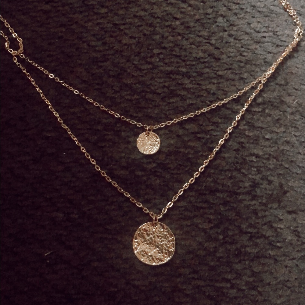 gold colored necklace